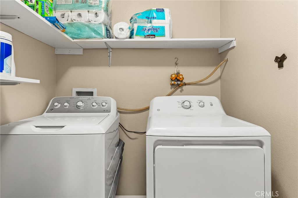 1560 Firestone Loop San Jose, CA 95116 - Photo 12 of 33 a utility room with dryer and washer