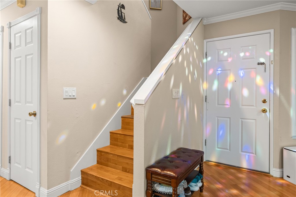 1560 Firestone Loop San Jose, CA 95116 - Photo 13 of 33 a view of entryway and hall with wooden floor
