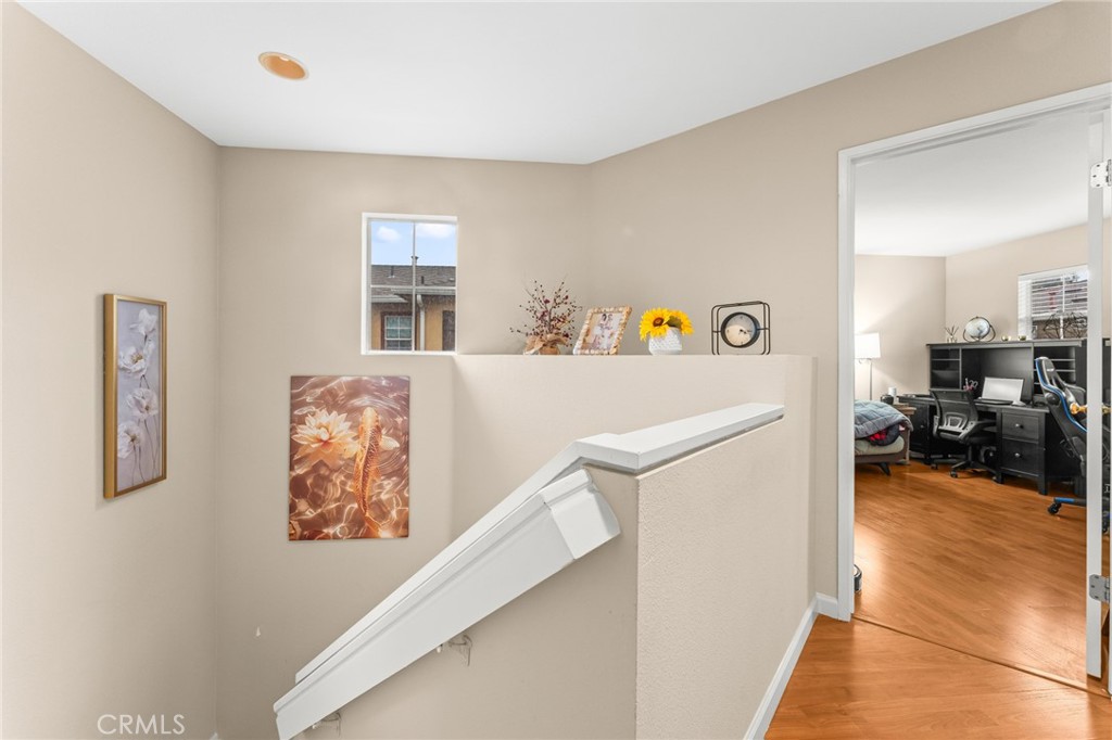 1560 Firestone Loop San Jose, CA 95116 - Photo 14 of 33 a view of a hallway with workspace and a window