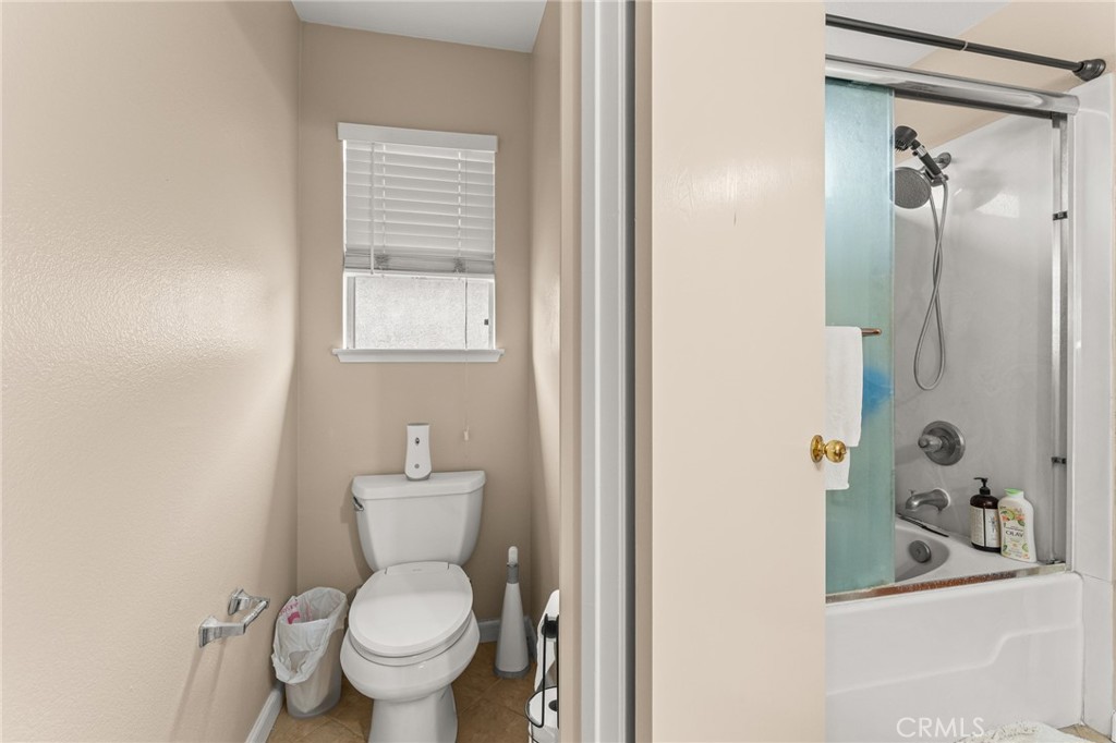 1560 Firestone Loop San Jose, CA 95116 - Photo 22 of 33 a bathroom with a toilet and a sink