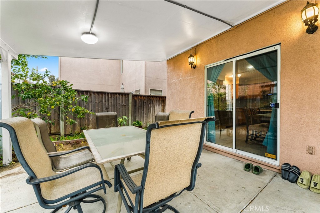 1560 Firestone Loop San Jose, CA 95116 - Photo 33 of 33 a patio with table and chairs