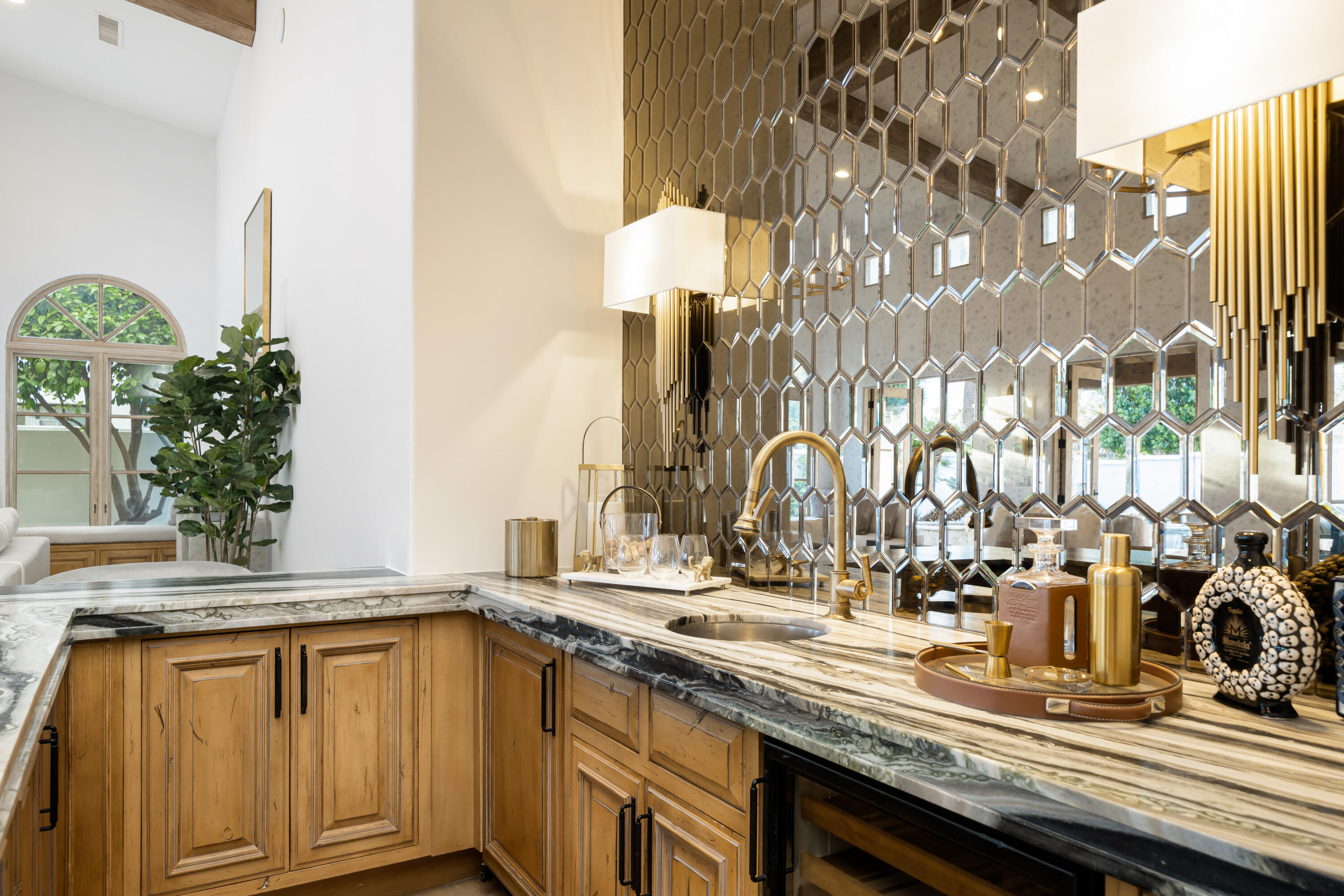 80820 Via Portofino La Quinta, CA 92253 - Photo 12 of 52 a kitchen with a sink and cabinets