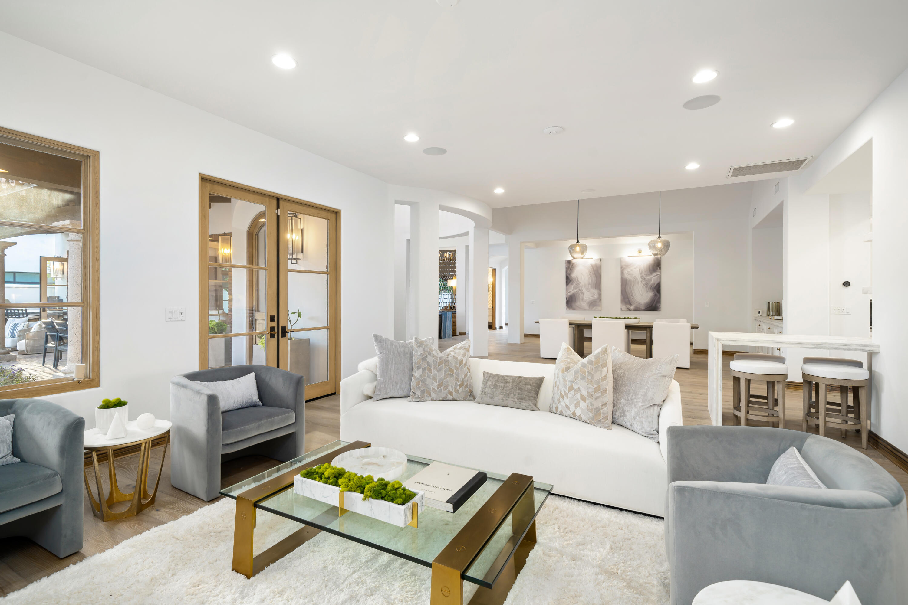80820 Via Portofino La Quinta, CA 92253 - Photo 19 of 52 a living room with furniture and a large window