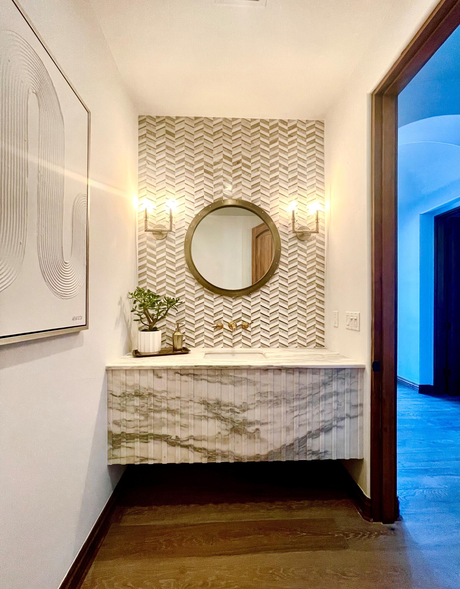 80820 Via Portofino La Quinta, CA 92253 - Photo 35 of 52 a bathroom with a sink and a mirror