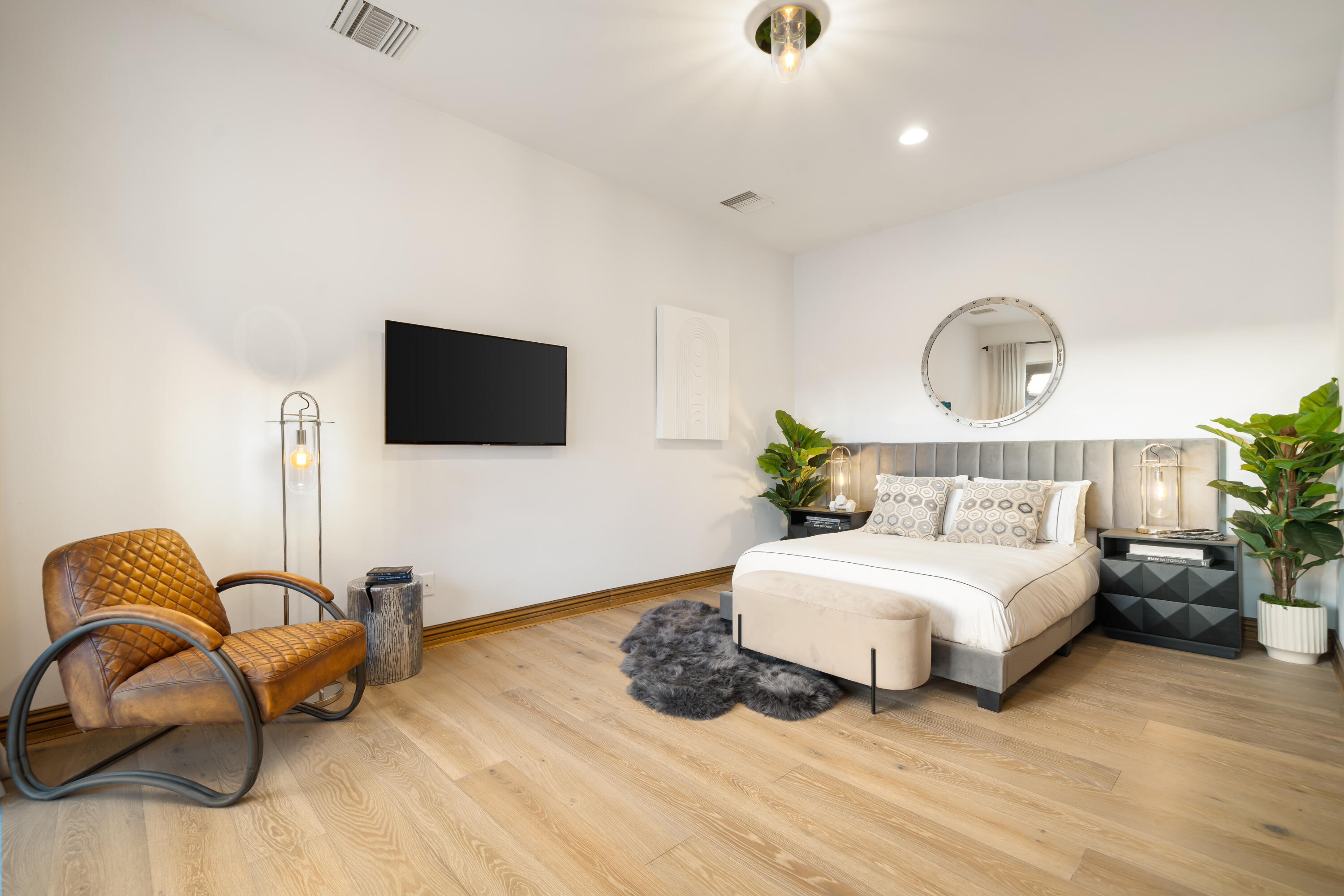 80820 Via Portofino La Quinta, CA 92253 - Photo 39 of 52 a bedroom with a bed and a flat screen tv