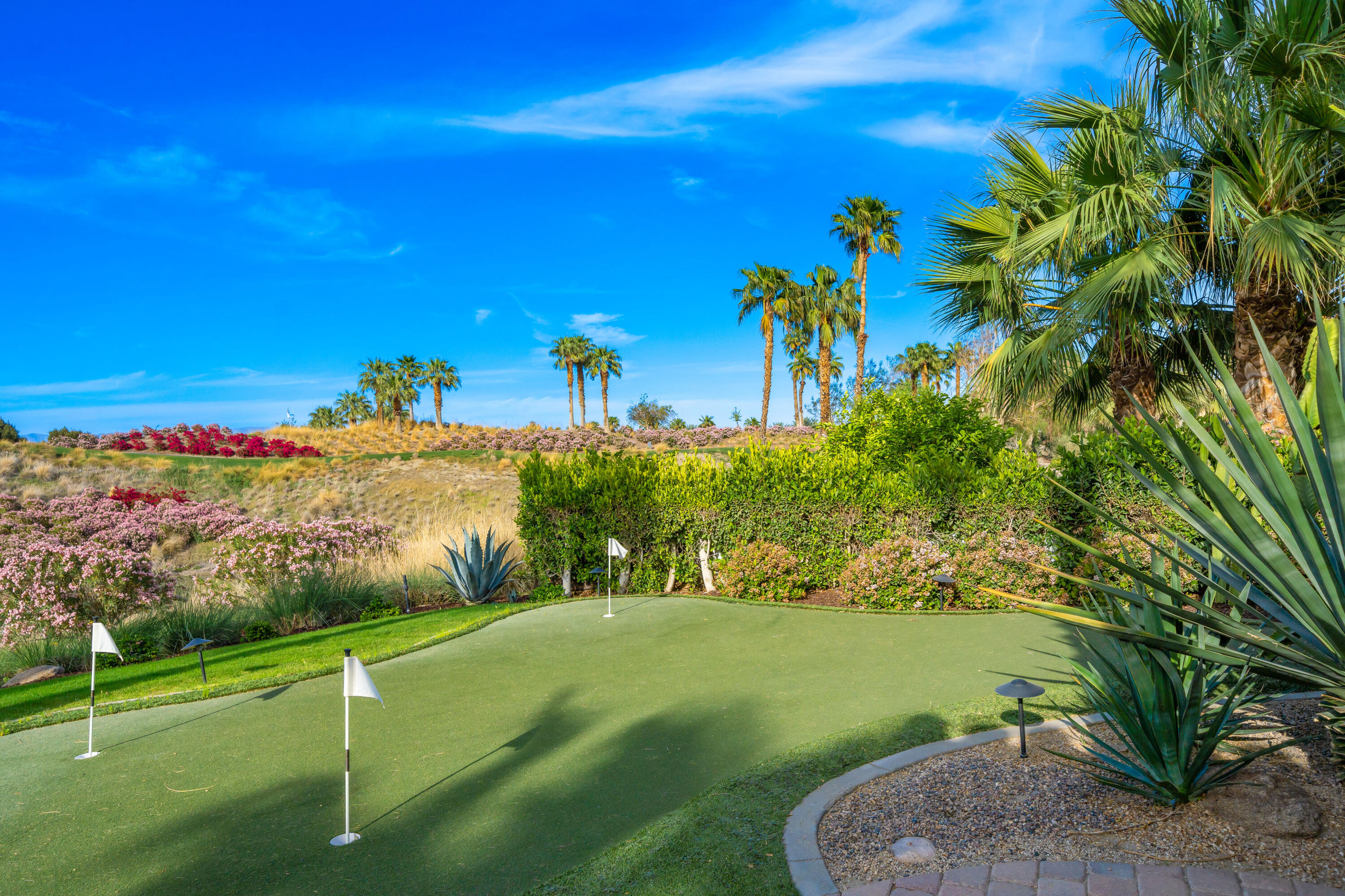 80820 Via Portofino La Quinta, CA 92253 - Photo 46 of 52 a view of a golf course with a lake