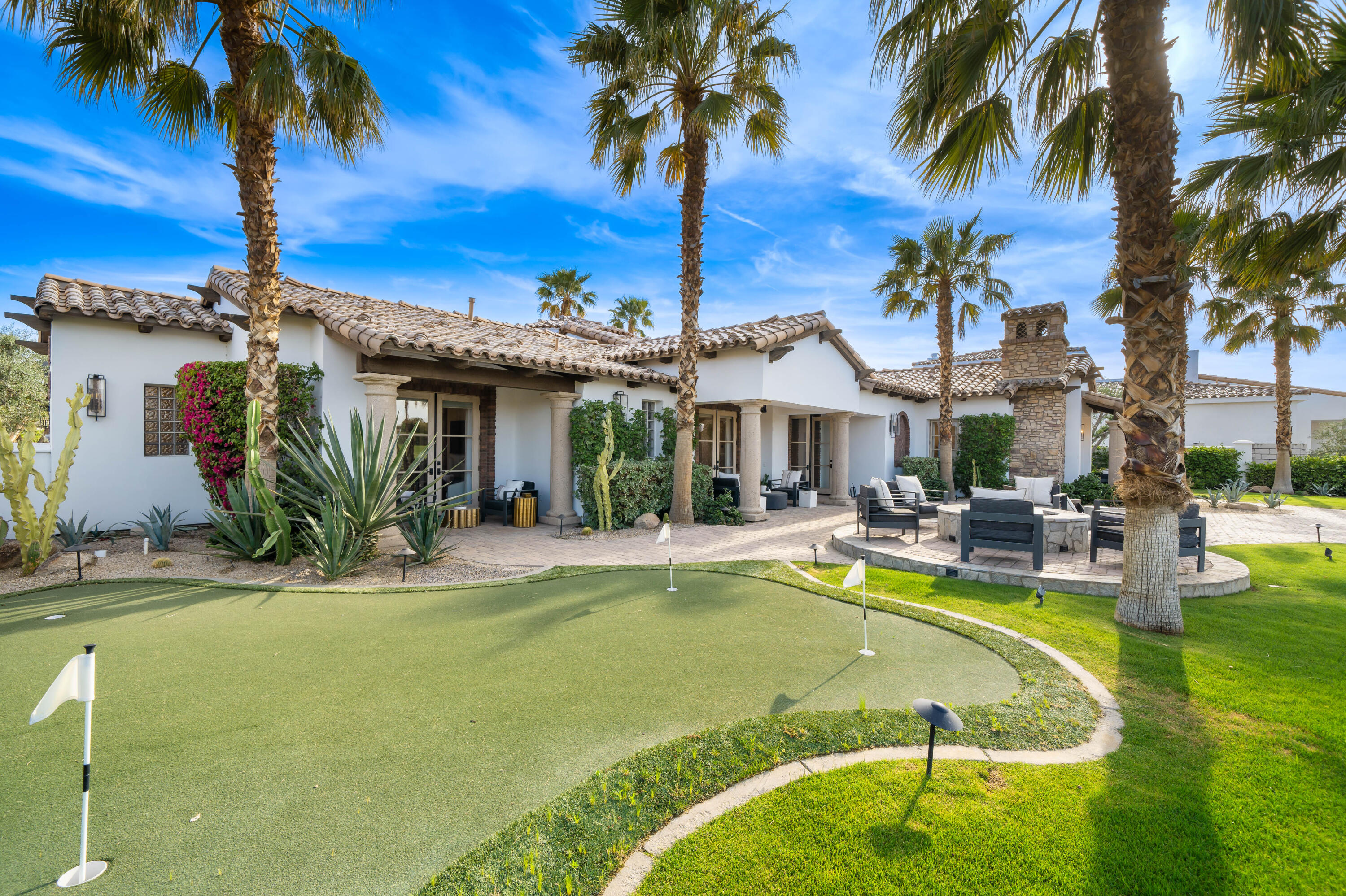 80820 Via Portofino La Quinta, CA 92253 - Photo 48 of 52 a view of a house with swimming pool and porch