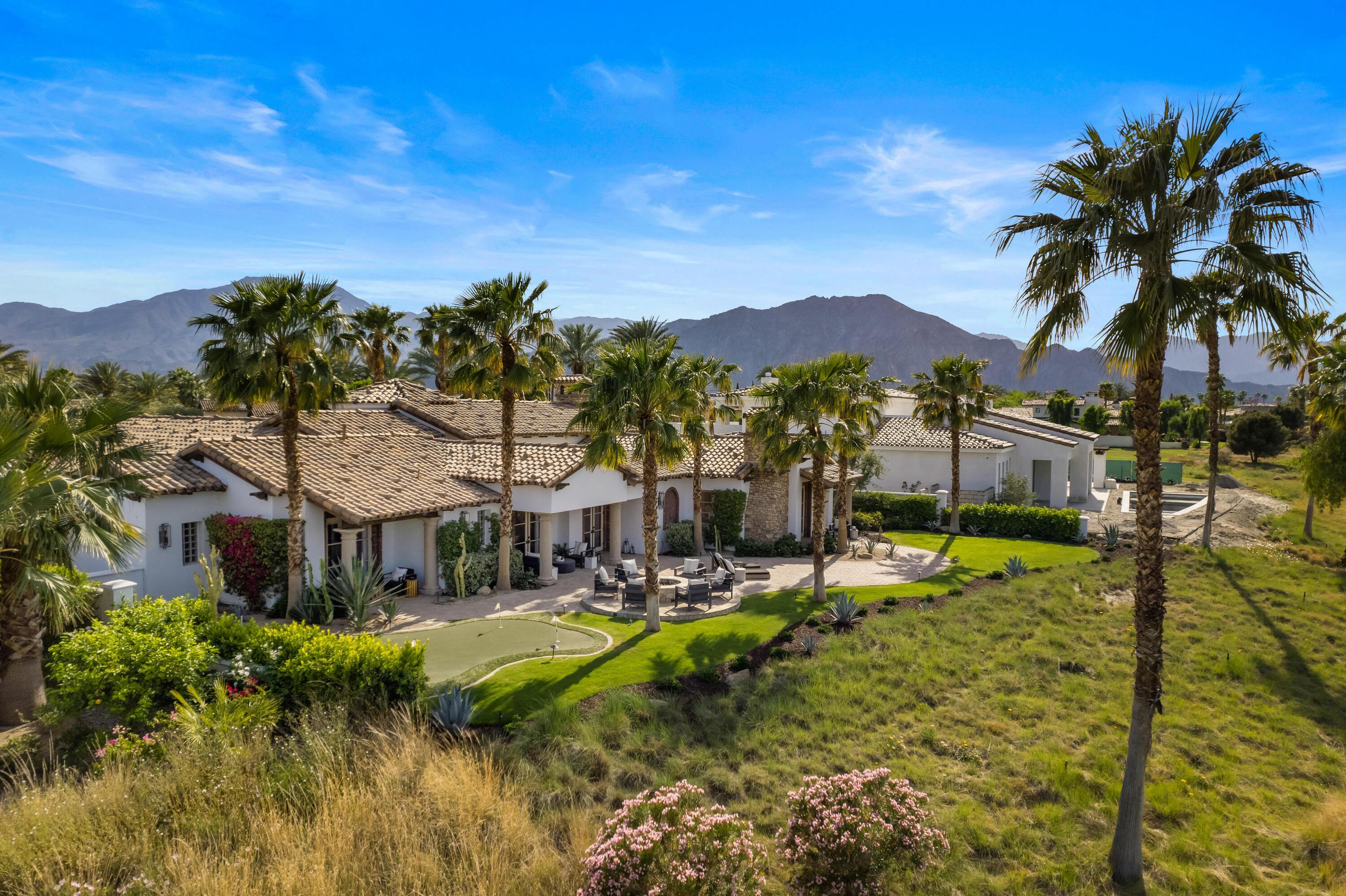 80820 Via Portofino La Quinta, CA 92253 - Photo 49 of 52 a view of a house with a yard and lake view
