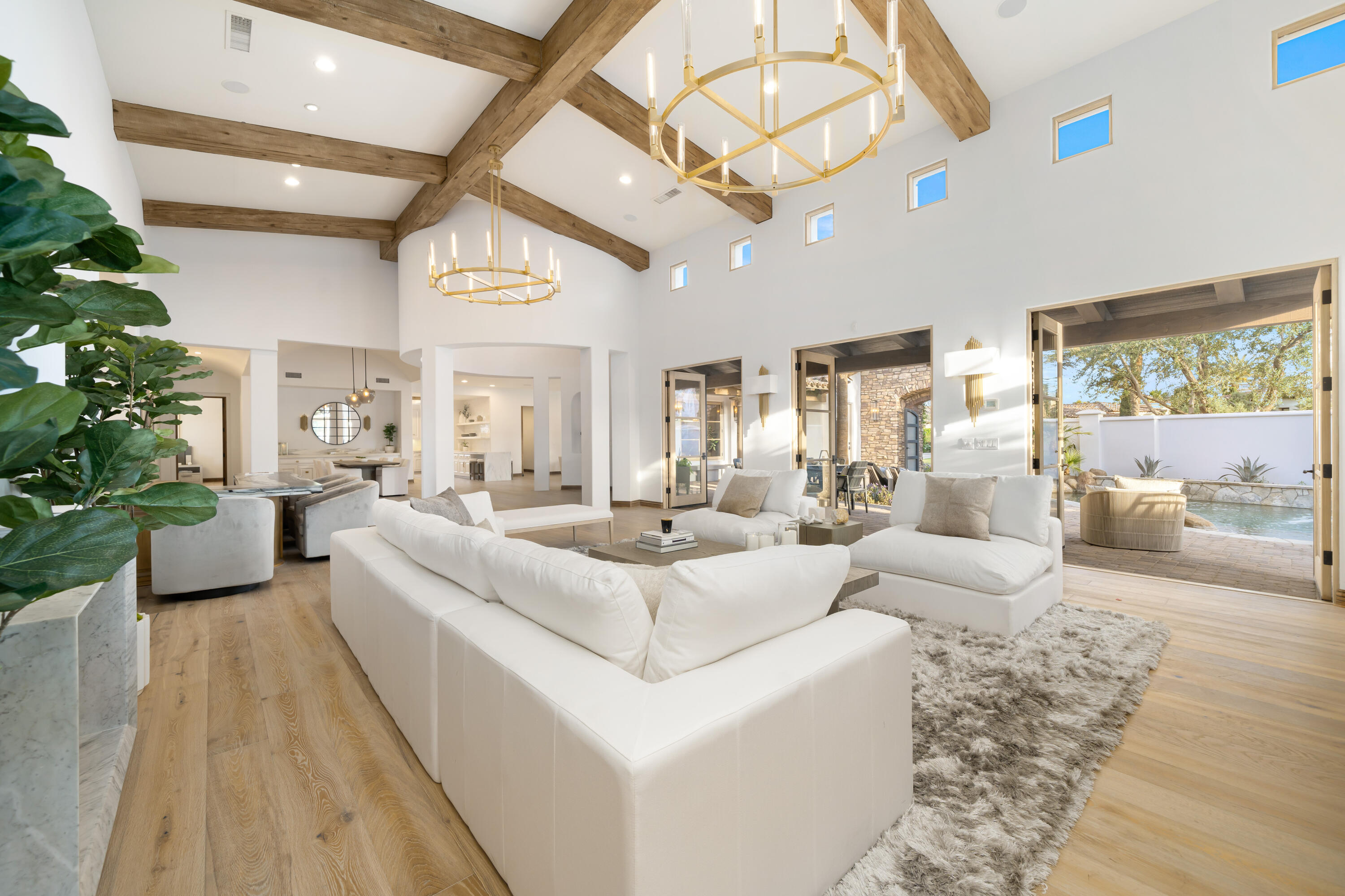 80820 Via Portofino La Quinta, CA 92253 - Photo 10 of 52 a living room with furniture and a large window