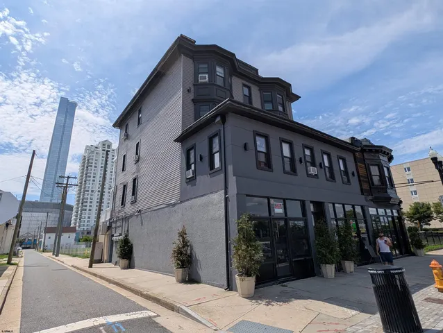 a view of a building with a street