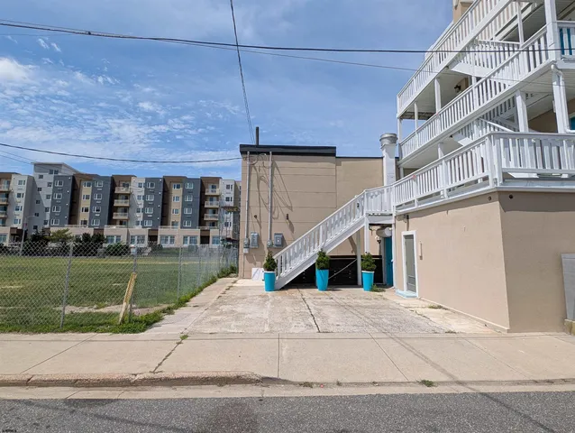 a view of a house and a yard