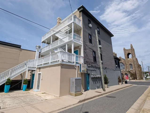 a view of a street with buildings