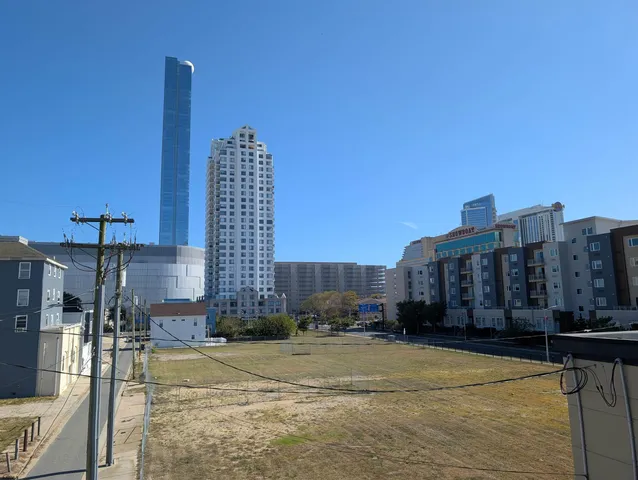 a view of city with tall buildings