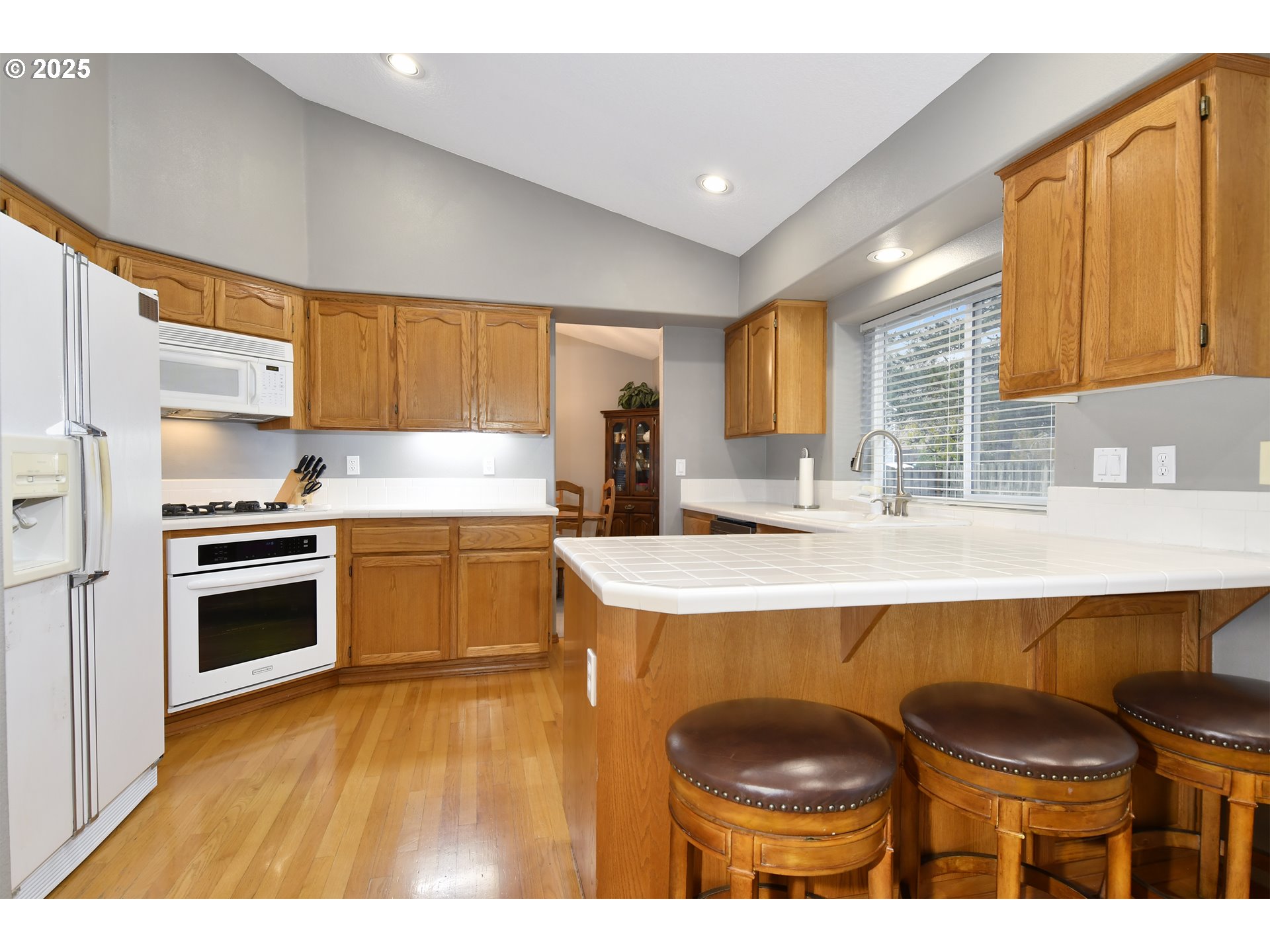 4396 Southeast 1st Terrace Gresham, OR 97080 - Photo 14 of 36 a kitchen with a sink and cabinets