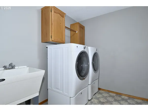 a bathroom with a sink vanity and a mirror