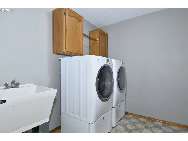 a bathroom with a sink vanity and a mirror