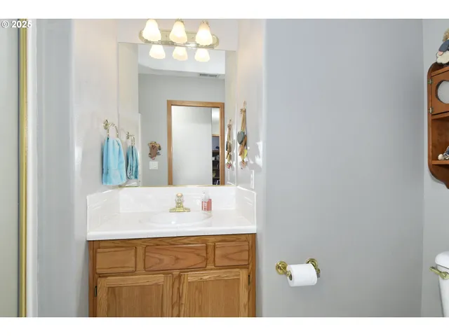 a view interior of kitchen and dining room with wooden floor