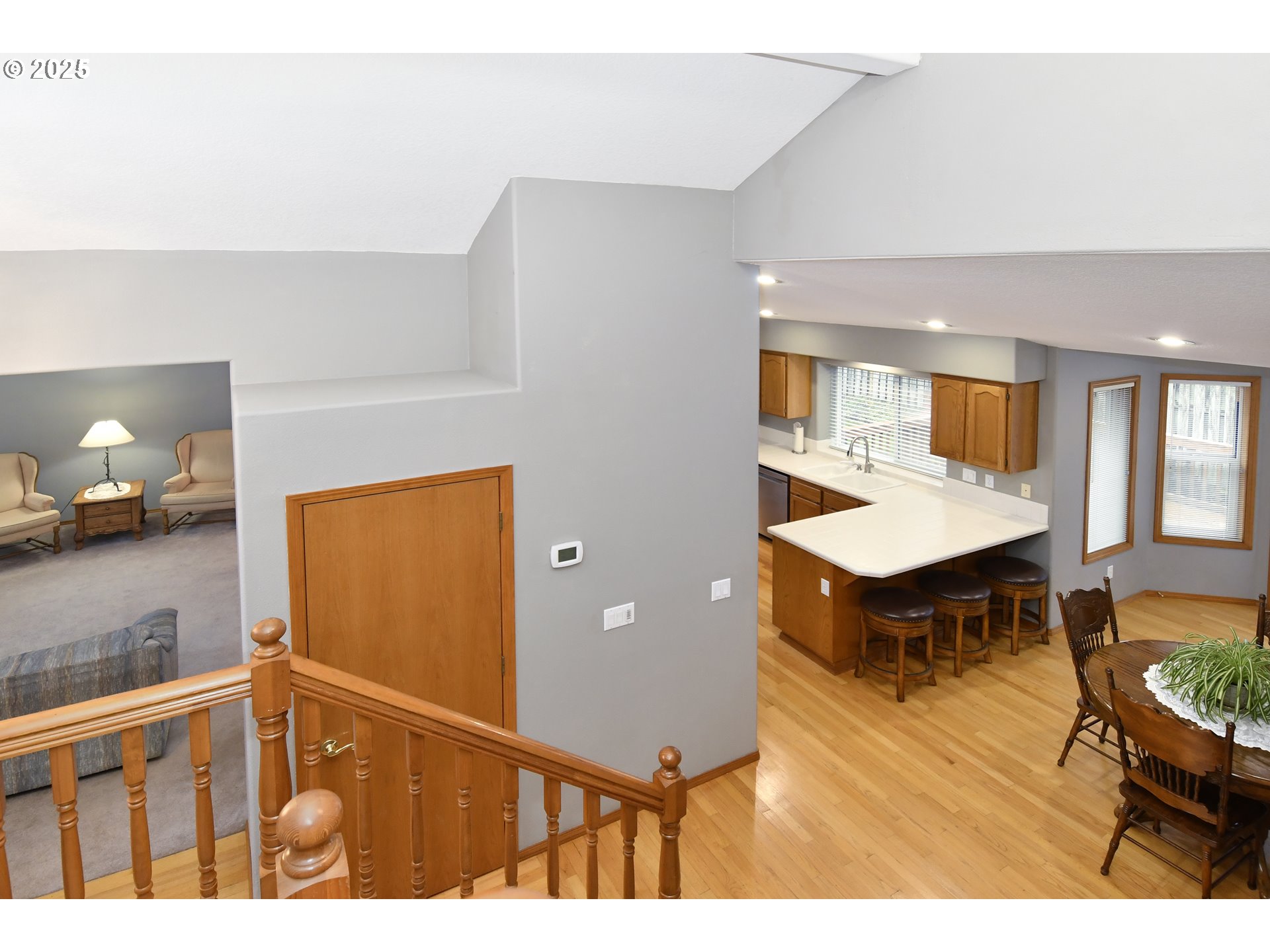 4396 Southeast 1st Terrace Gresham, OR 97080 - Photo 23 of 36 a view interior of kitchen and dining room with wooden floor