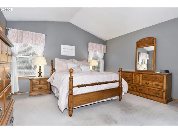 a bedroom with a bed and closet