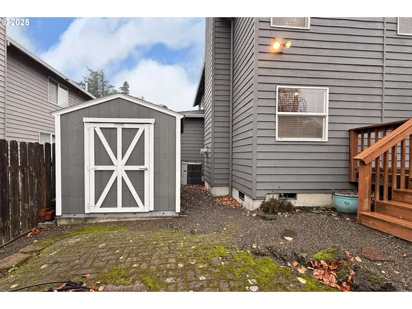 a view of balcony with wooden floor and outdoor seating