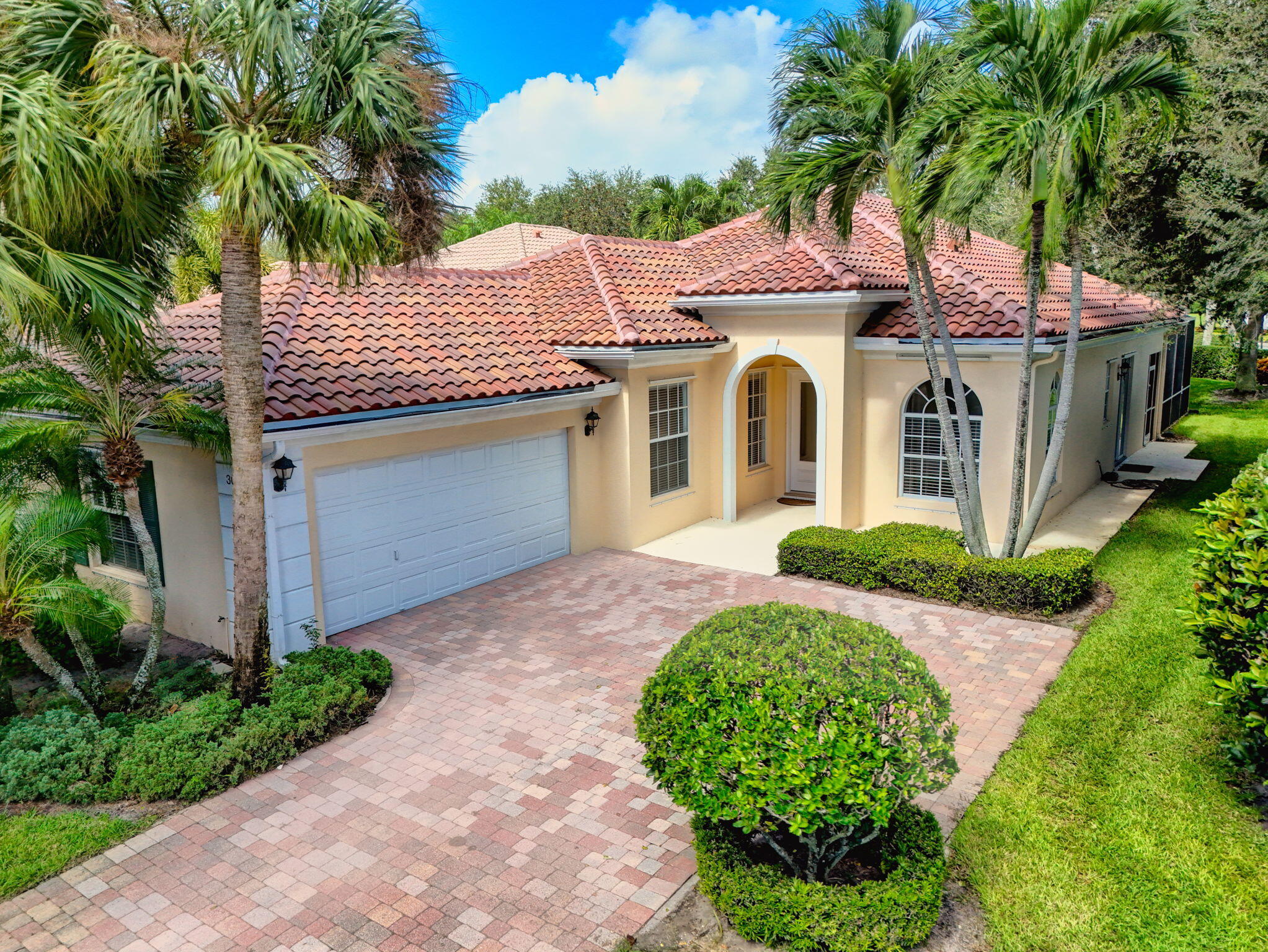 302 Aegean Road Palm Beach Gardens, FL 33410 - Photo 1 of 62 Corner Lot Front View