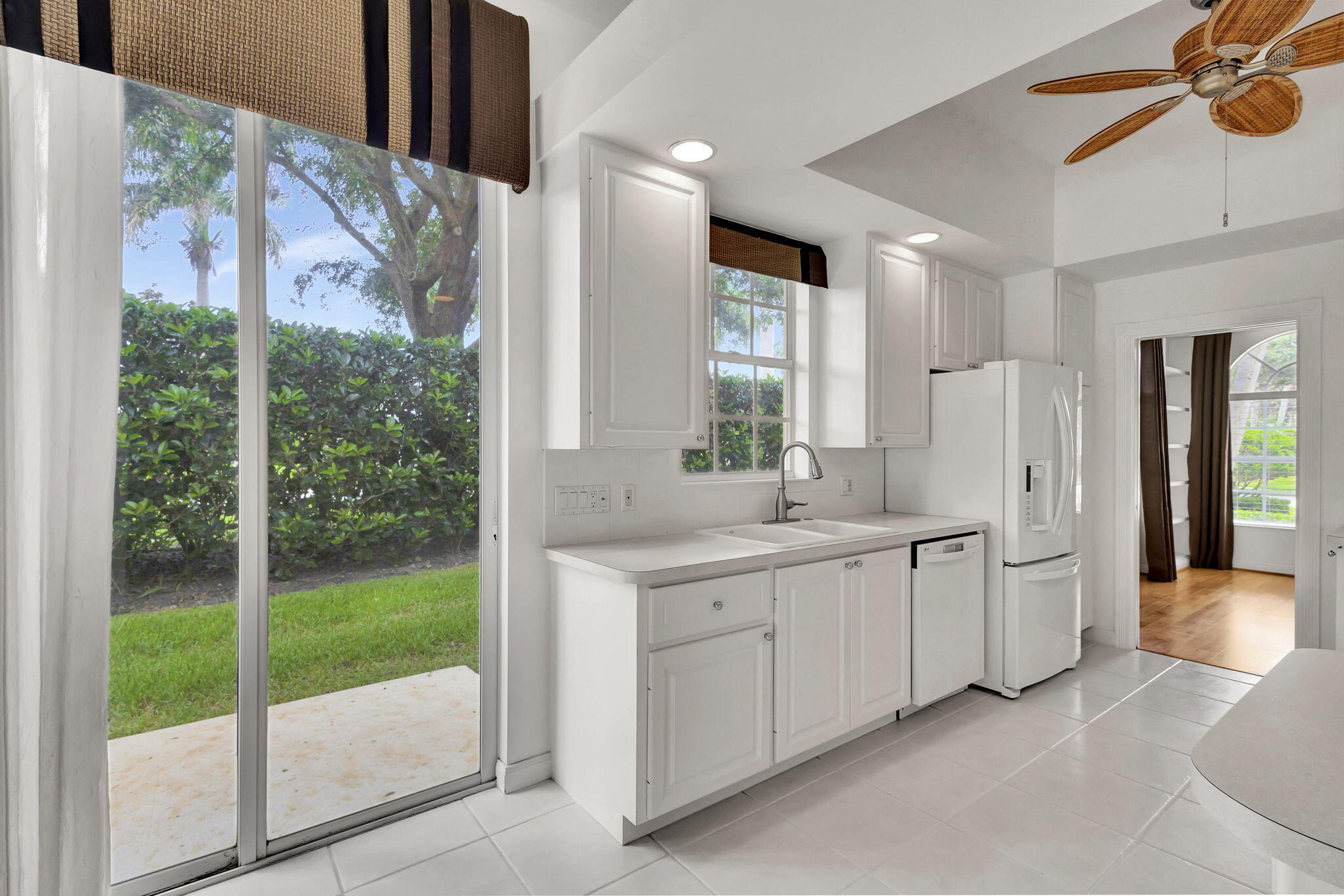 302 Aegean Road Palm Beach Gardens, FL 33410 - Photo 14 of 62 Kitchen into Office/Den