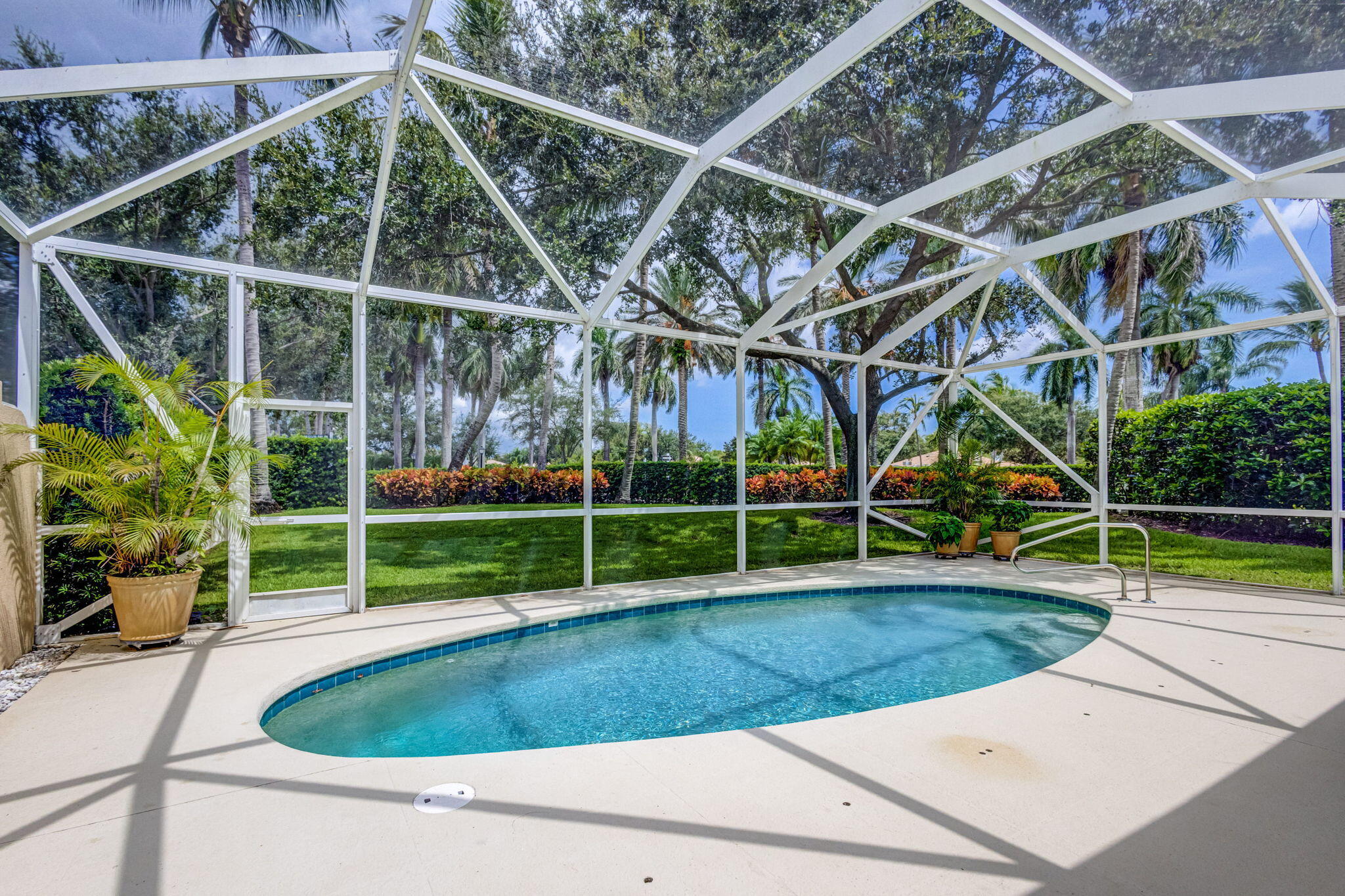 302 Aegean Road Palm Beach Gardens, FL 33410 - Photo 2 of 62 Heated Screened Pool