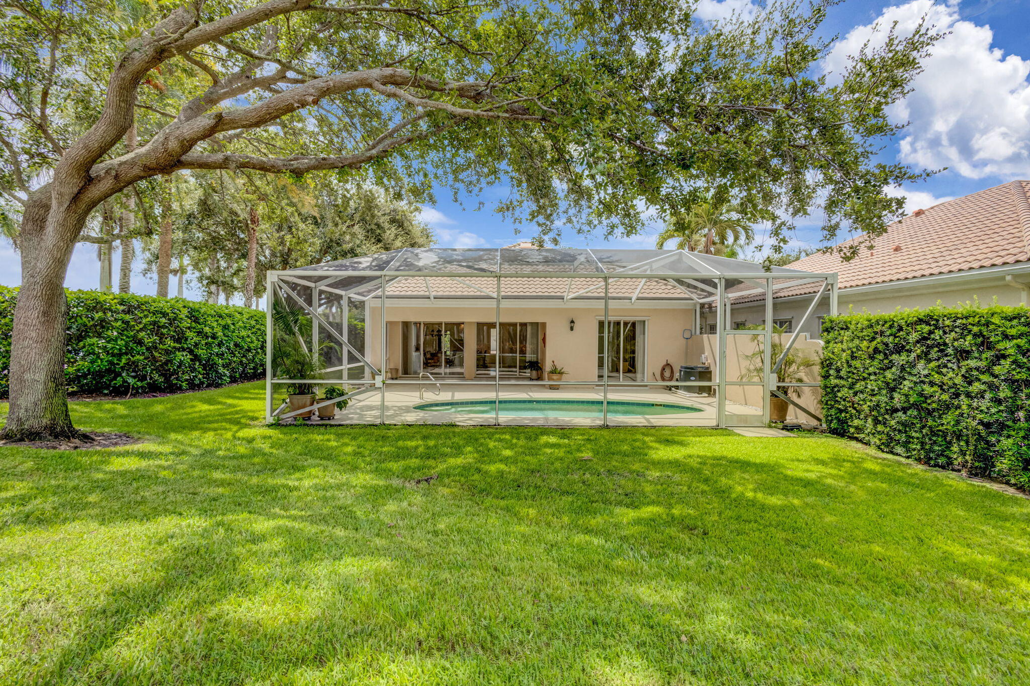 302 Aegean Road Palm Beach Gardens, FL 33410 - Photo 46 of 62 Rear View of Home