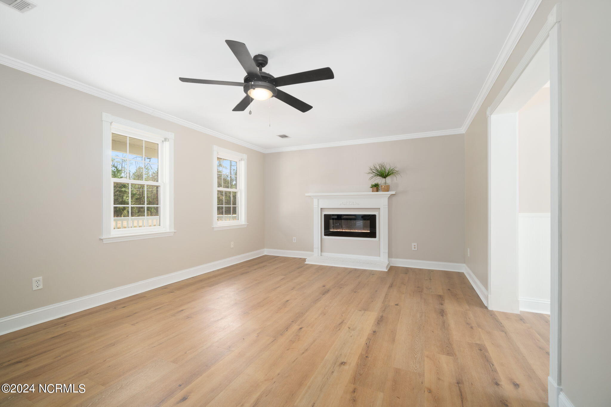 281 Becton Road Havelock, NC 28532 - Photo 13 of 57 Open living room w/ fireplace