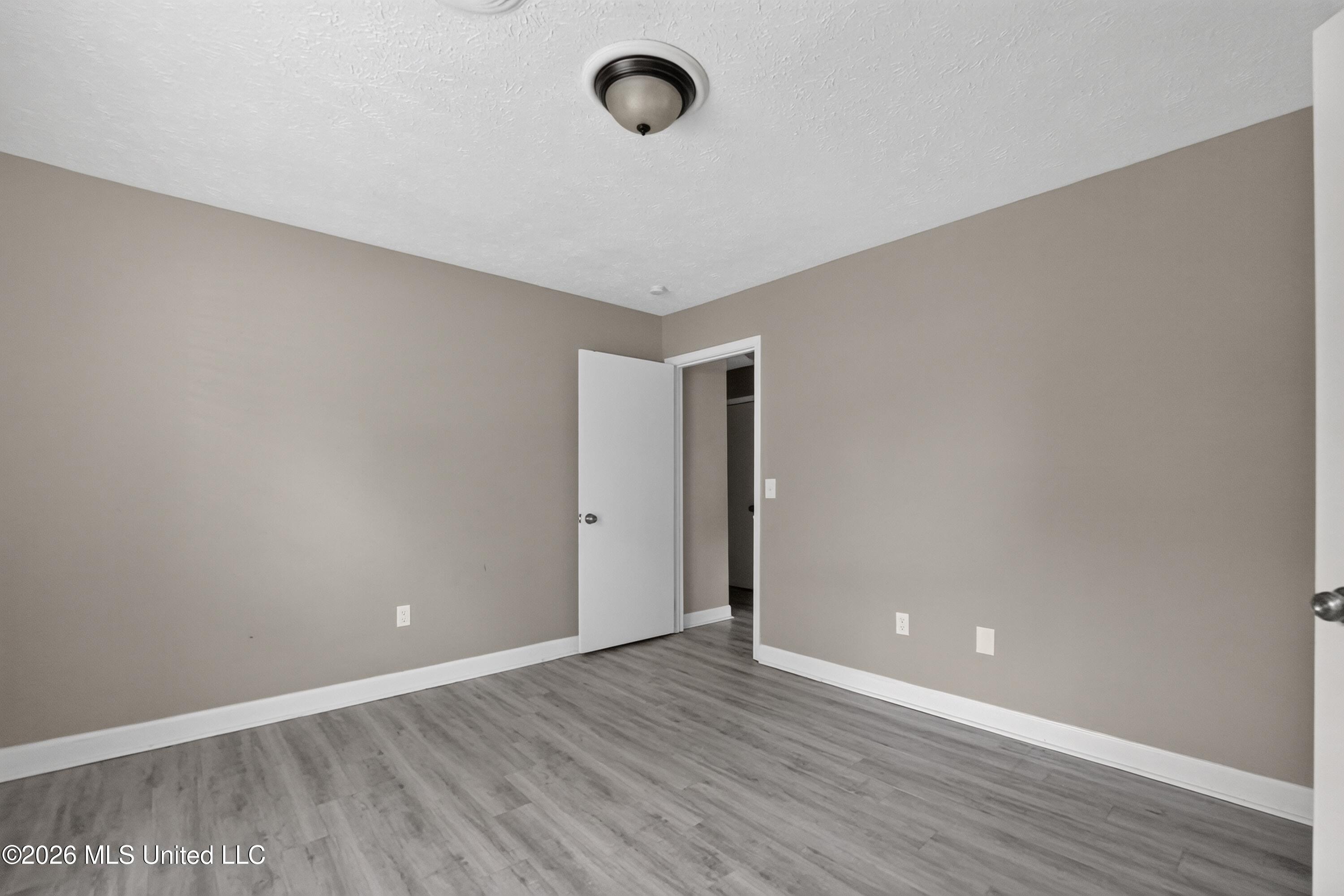 2050 Gateway Drive Ridgeland, MS 39157 - Photo 16 of 24 16_2050_Gateway_Dr-Bedroom-8601