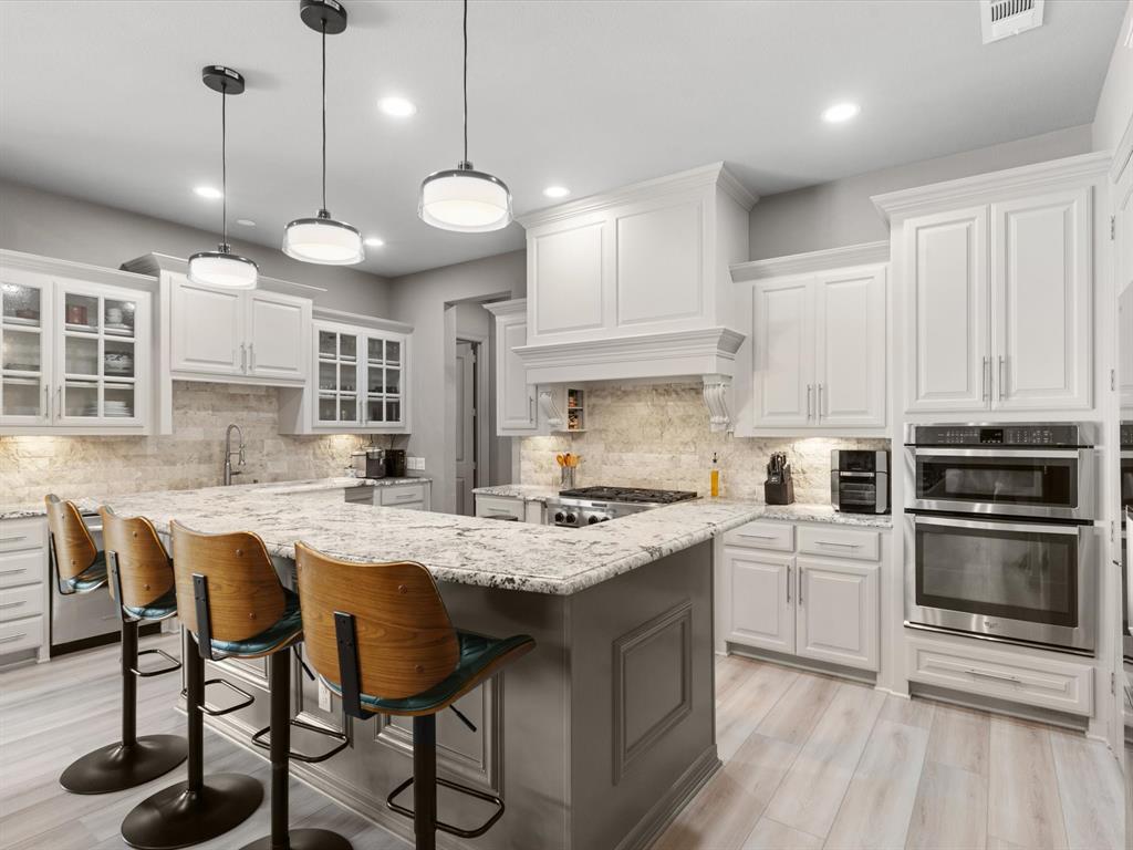 111 Old Base Road Aurora, TX 76078 - Photo 10 of 38 Spacious kitchen and dining area ideal for everyday living and entertaining.