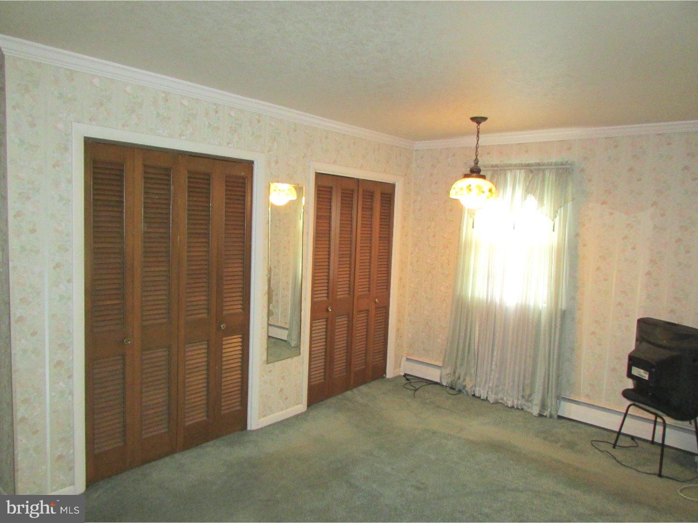 22 North County Line Road Telford, PA 18969 - Photo 16 of 25 a view of an empty room with a window