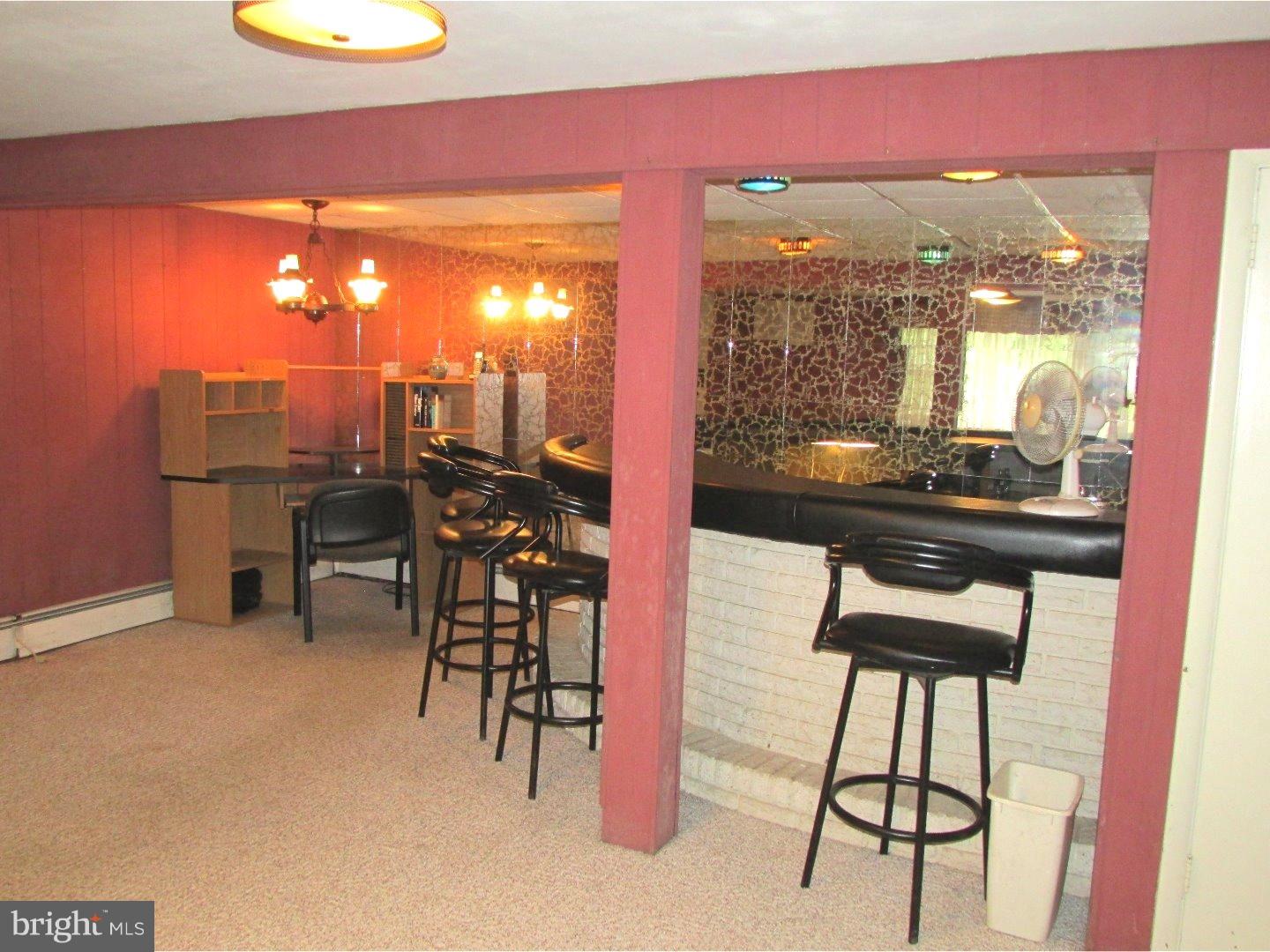 22 North County Line Road Telford, PA 18969 - Photo 17 of 25 a dining room with furniture and a floor to ceiling window