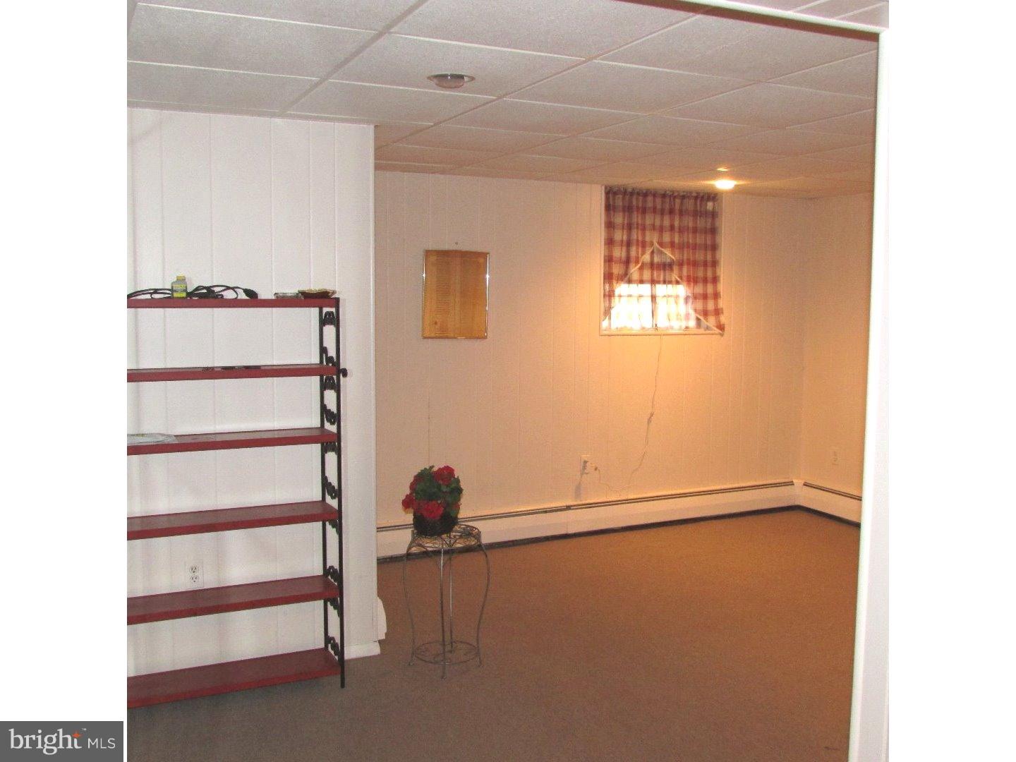 22 North County Line Road Telford, PA 18969 - Photo 19 of 25 a view of an empty room with a window