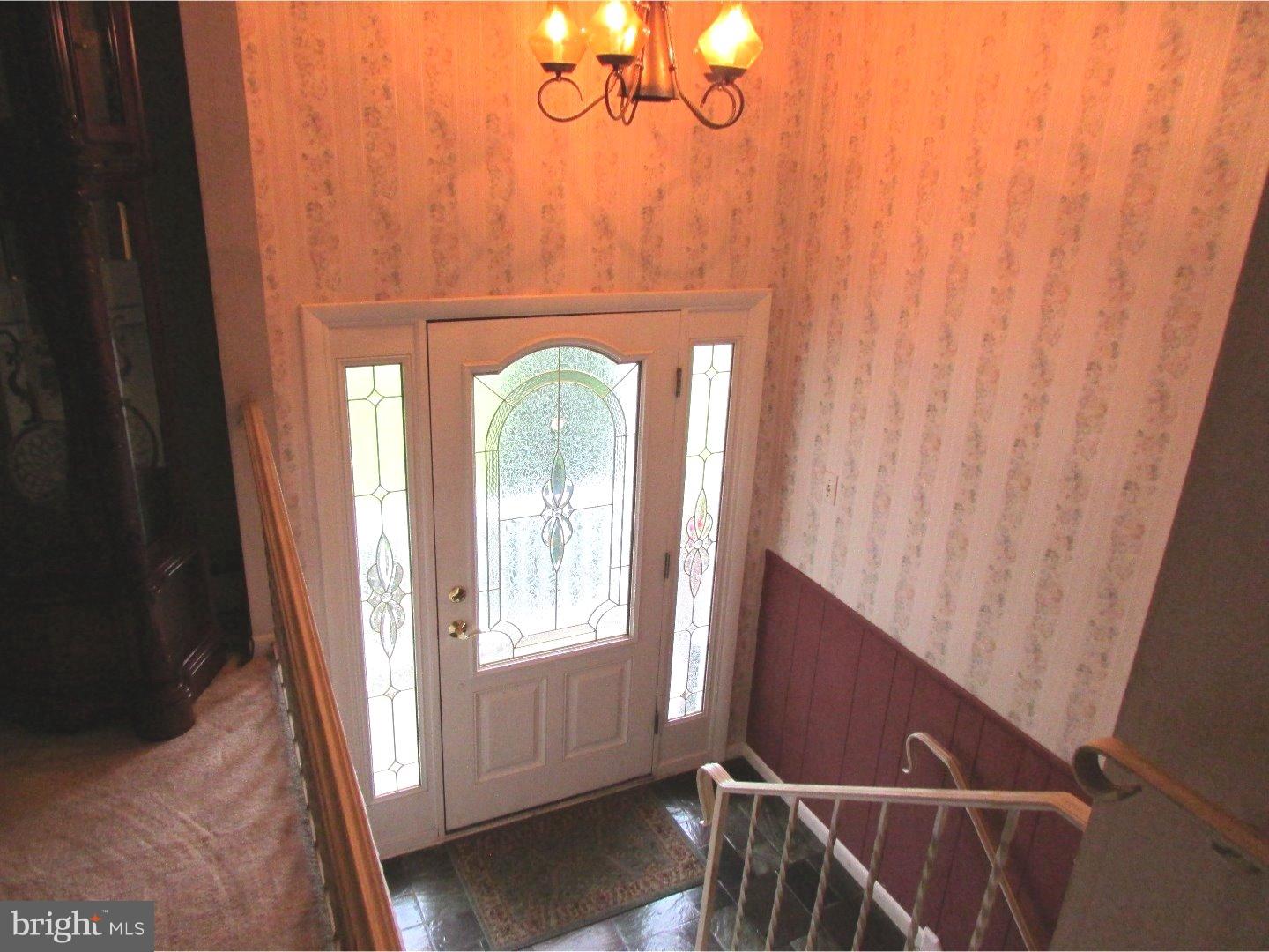 22 North County Line Road Telford, PA 18969 - Photo 3 of 25 a view of entryway with wooden floor
