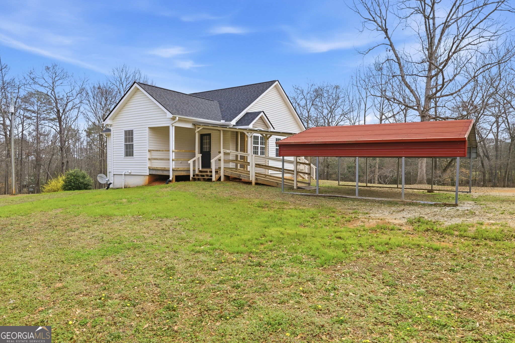 1429 Crumps Bridge Road Martin, GA 30557 - Photo 12 of 54 a front view of a house with a yard