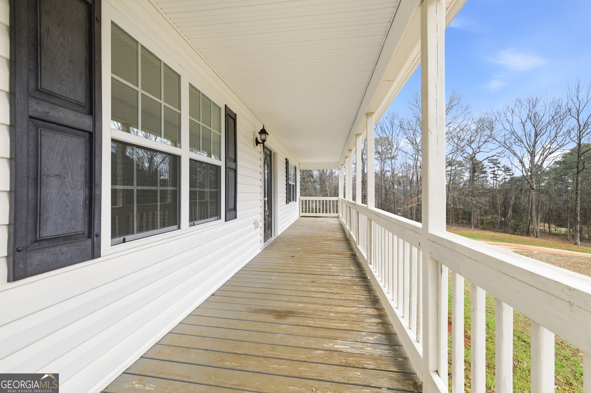 1429 Crumps Bridge Road Martin, GA 30557 - Photo 13 of 54 a view of a building from a balcony