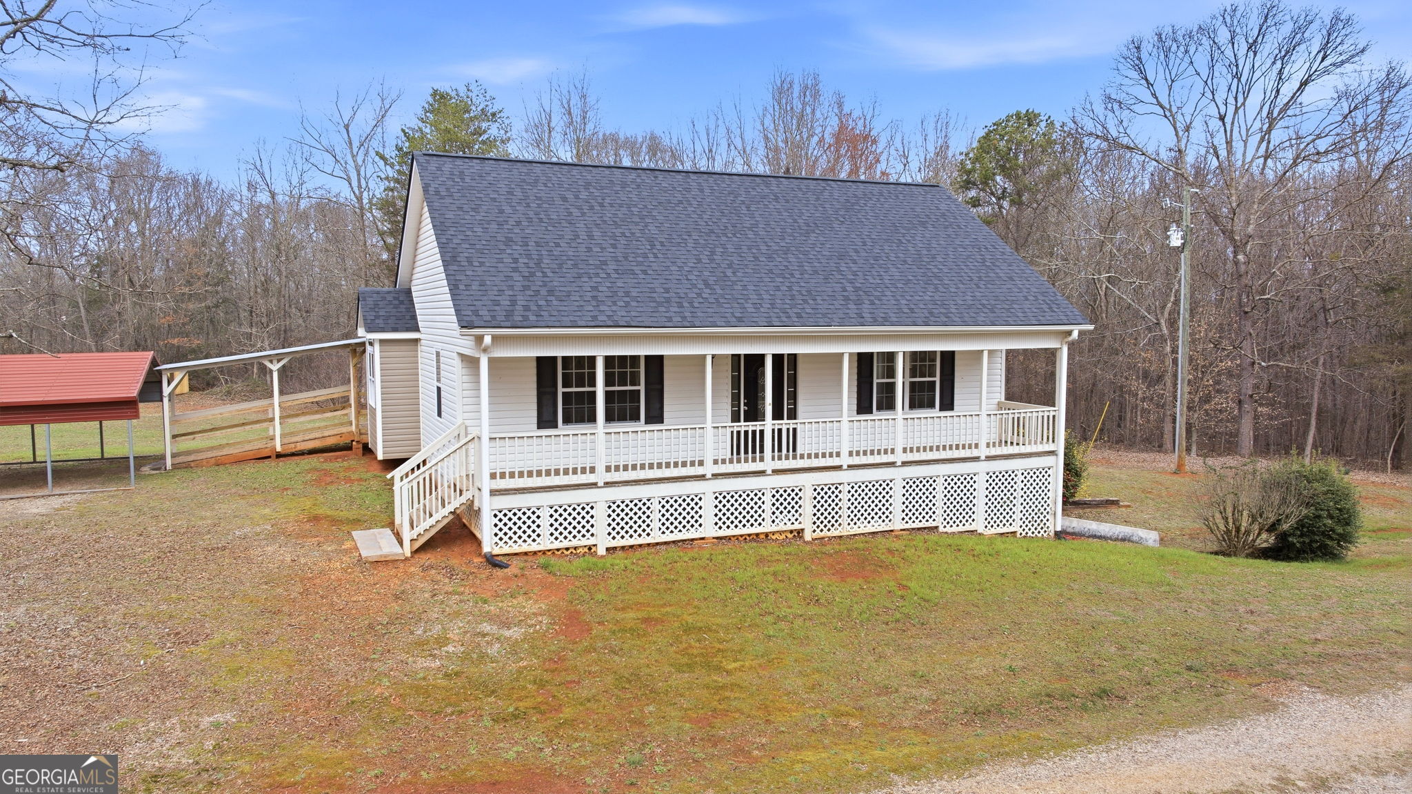 1429 Crumps Bridge Road Martin, GA 30557 - Photo 2 of 54 a house view with a garden space