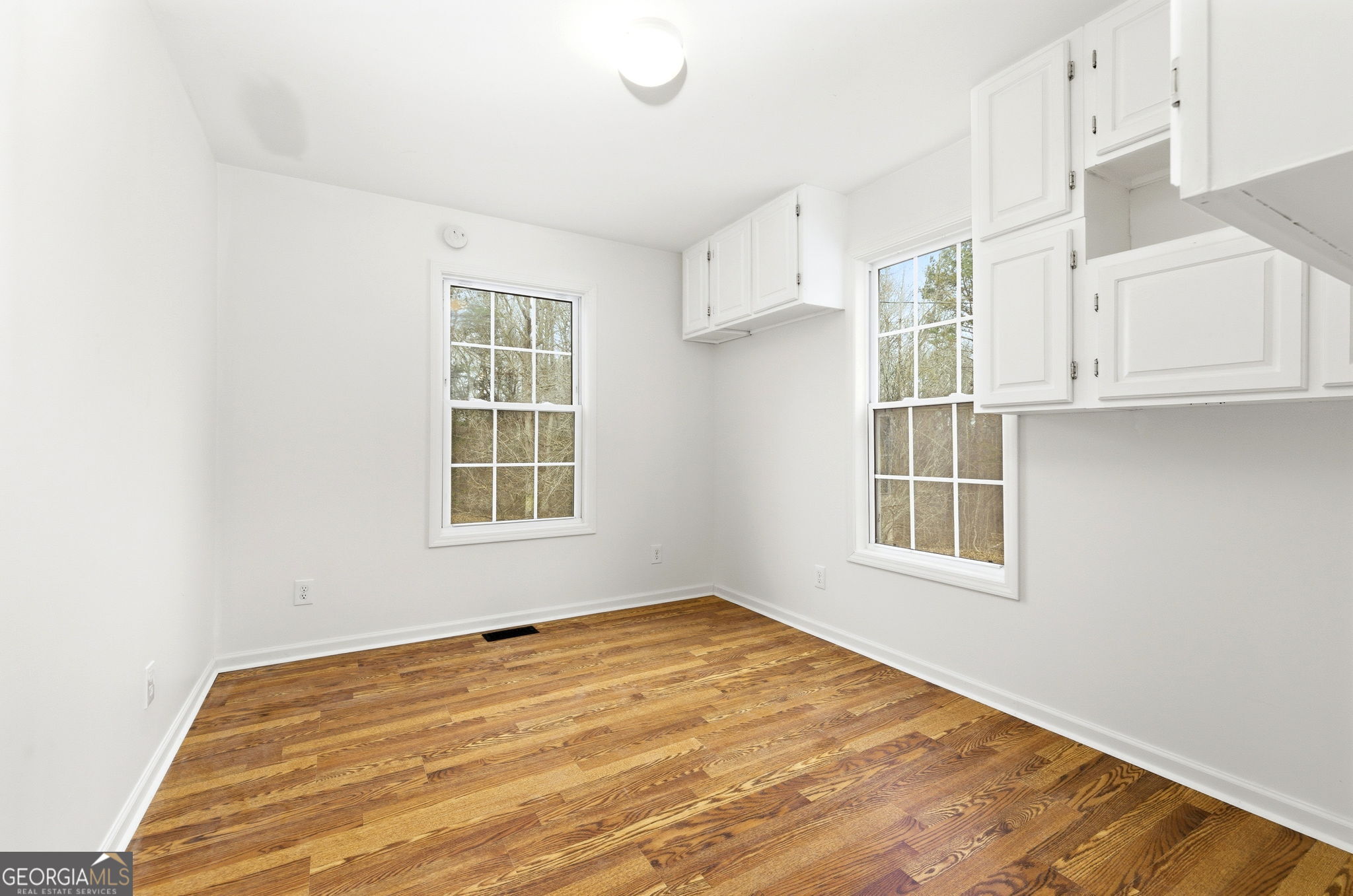 1429 Crumps Bridge Road Martin, GA 30557 - Photo 21 of 54 a view of an empty room with a window