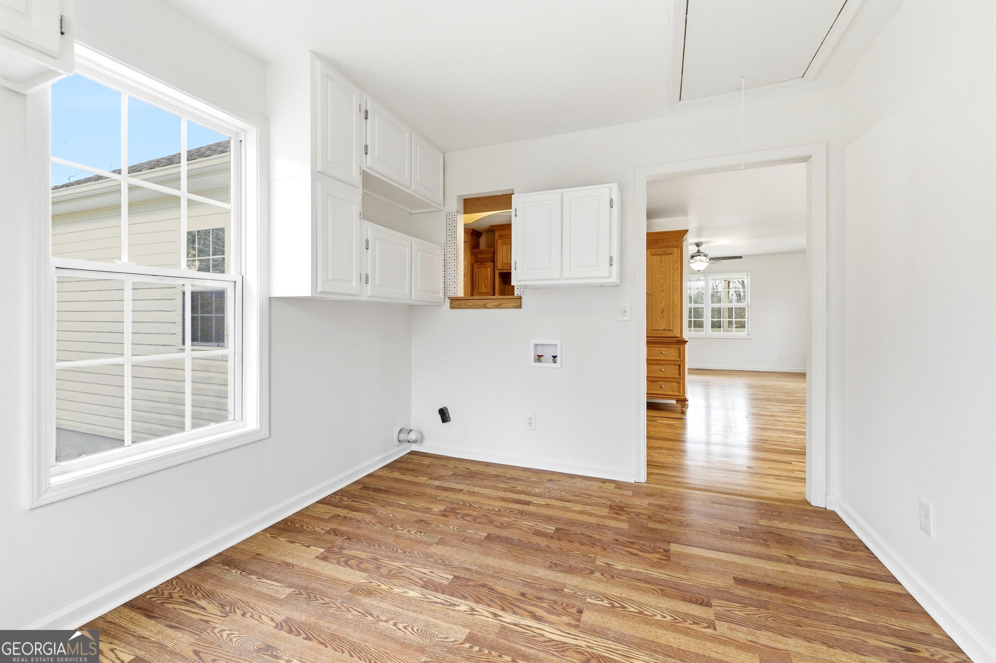 1429 Crumps Bridge Road Martin, GA 30557 - Photo 22 of 54 a view of empty room with wooden floor and windows