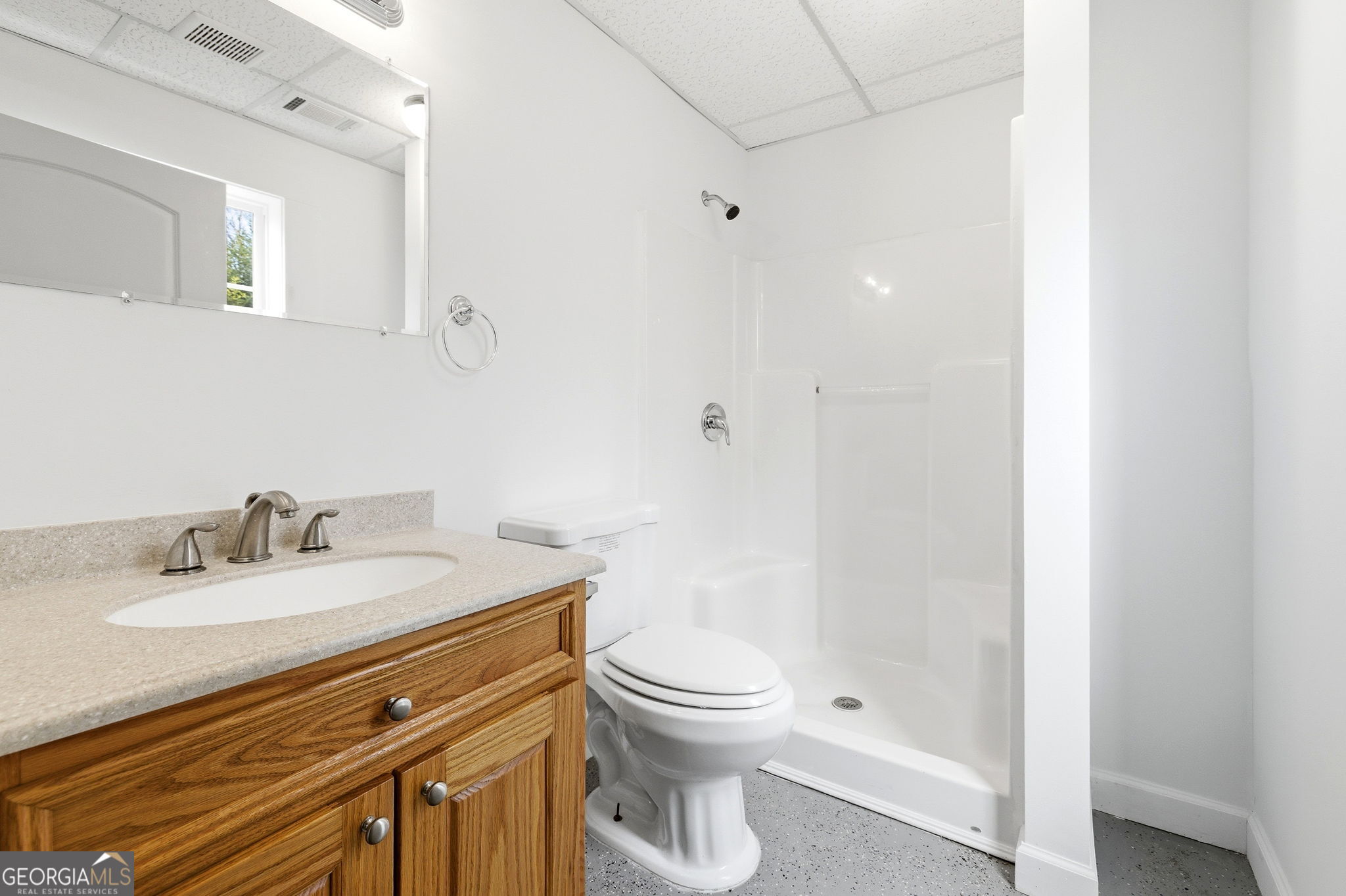 1429 Crumps Bridge Road Martin, GA 30557 - Photo 30 of 54 a bathroom with a sink toilet vanity and shower