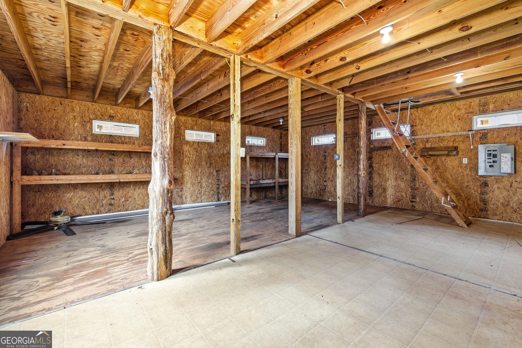 1429 Crumps Bridge Road Martin, GA 30557 - Photo 38 of 54 a view of an empty room with wooden floor and a window