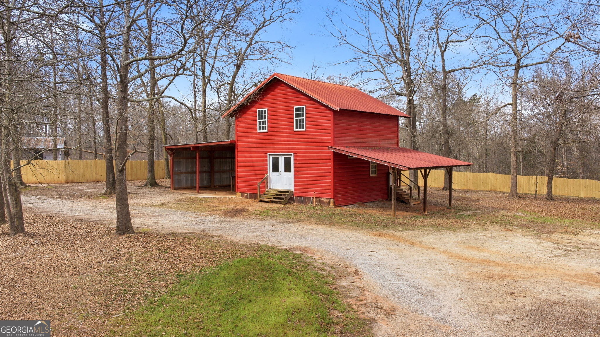 1429 Crumps Bridge Road Martin, GA 30557 - Photo 4 of 54 a front view of a house with a yard and garage