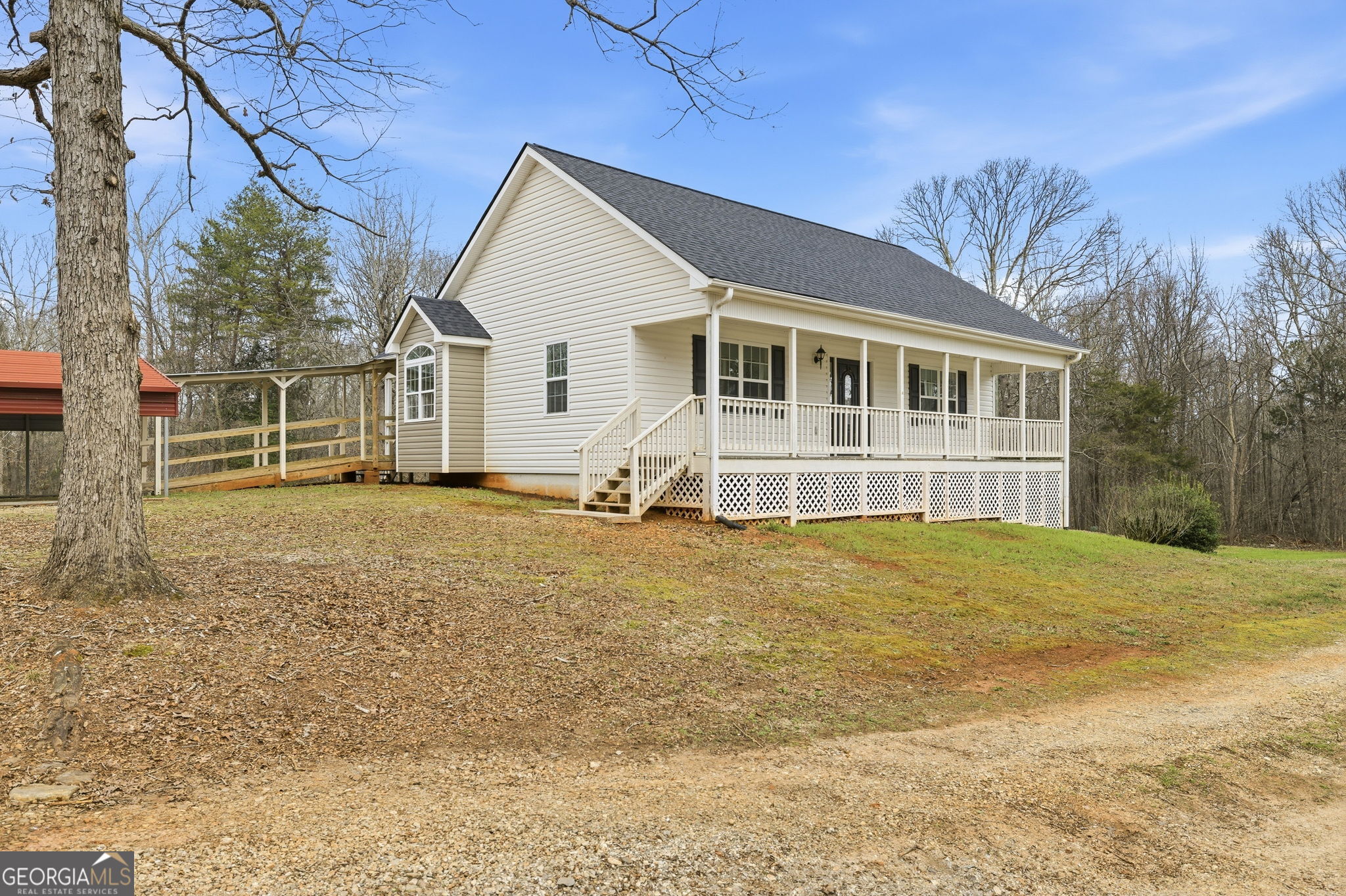 1429 Crumps Bridge Road Martin, GA 30557 - Photo 7 of 54 a front view of a house with yard