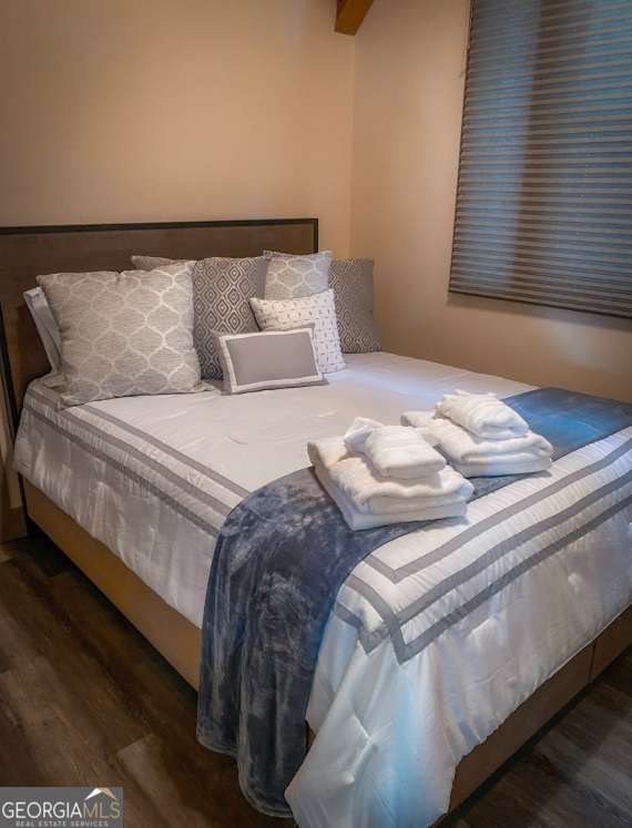 544 West Main Street Blue Ridge, GA 30513 - Photo 13 of 19 a bedroom with bed and window