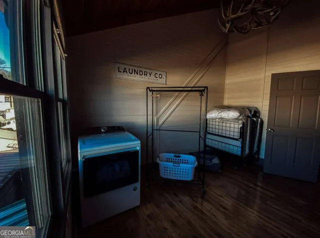 a kitchen with a sink and refrigerator