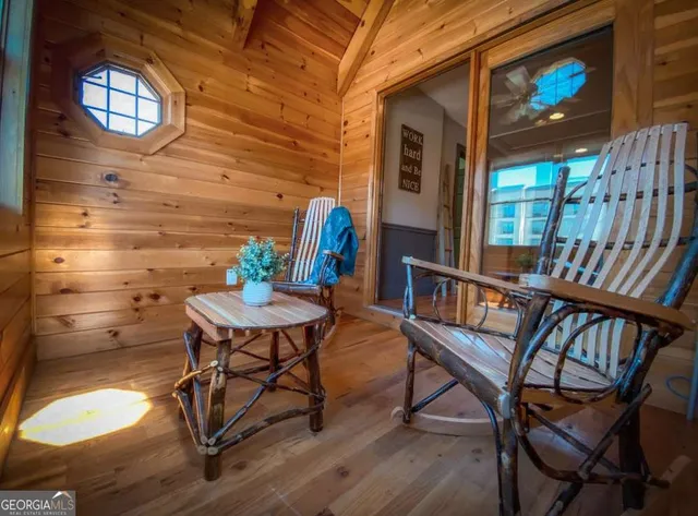 a view of a balcony with chairs