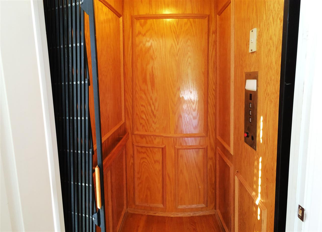 12604 Port Chester Court Raleigh, NC 27614 - Photo 10 of 25 Wood Panel Elevator