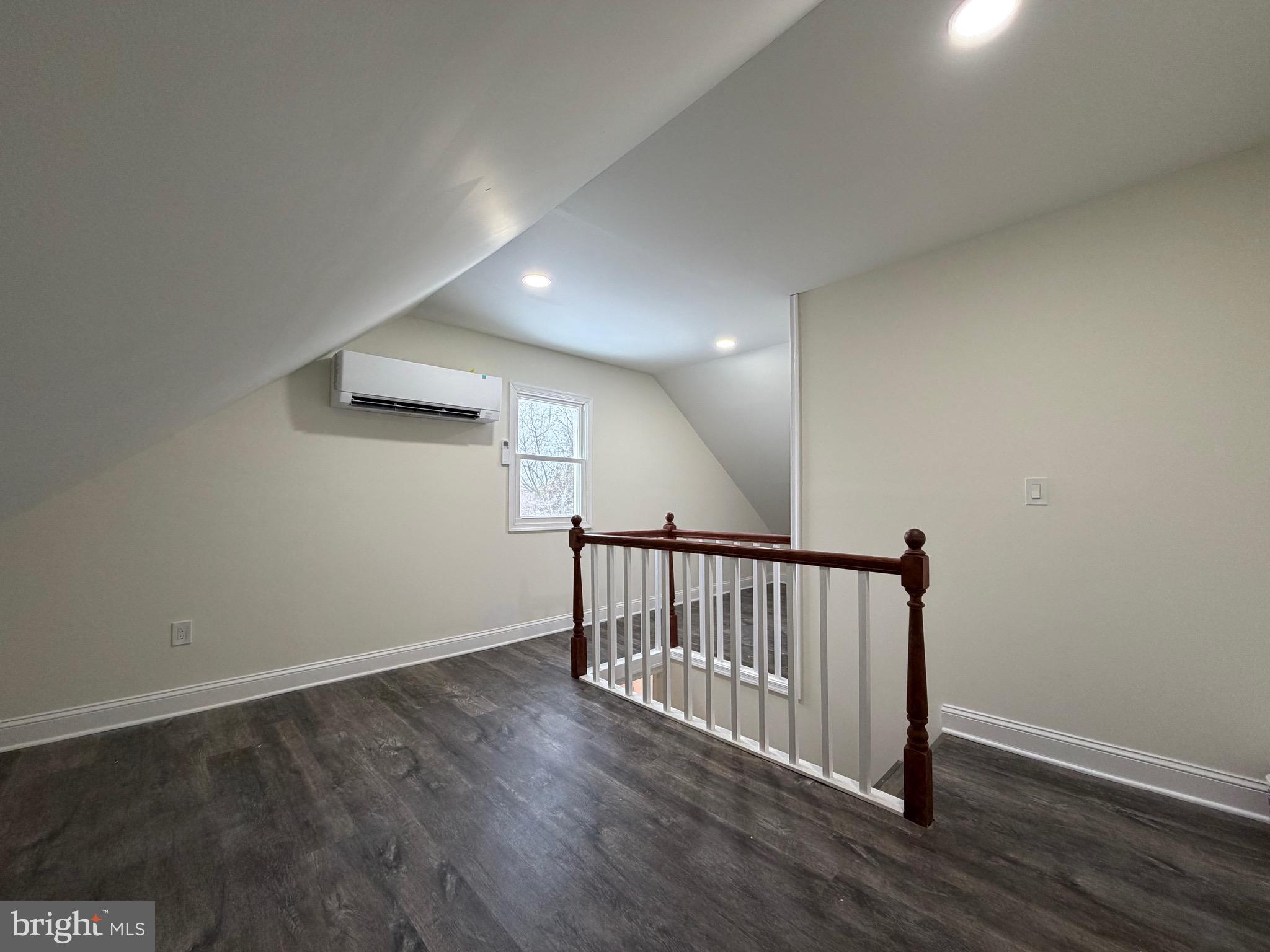 197 Main Street Hartly, DE 19953 - Photo 15 of 17 a view of hallway with wooden floor