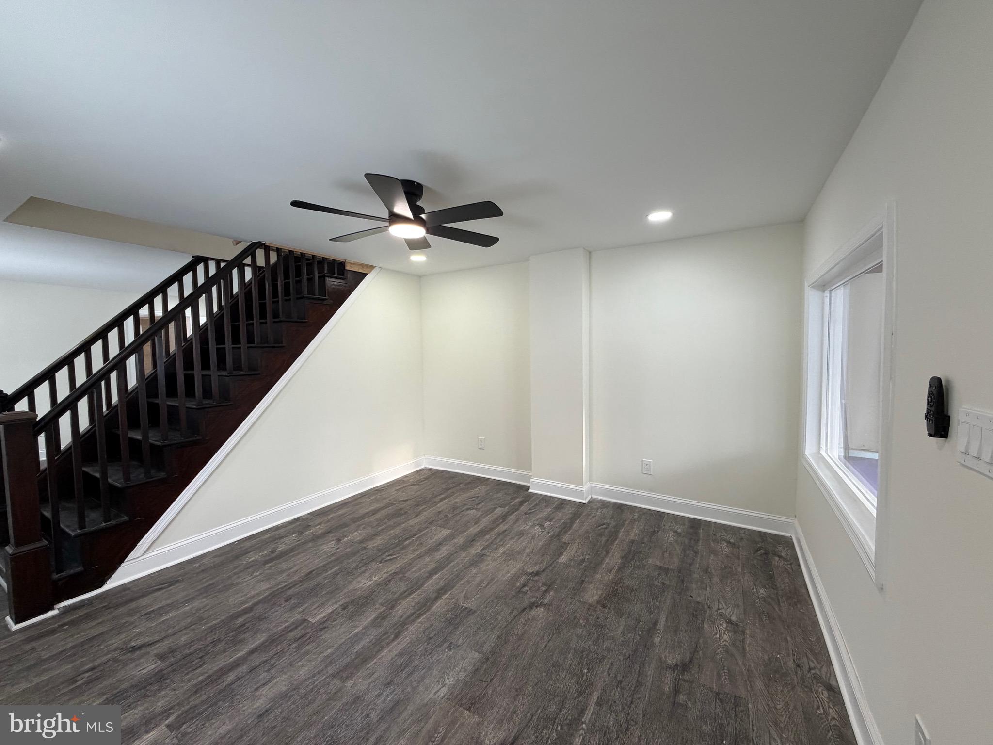 197 Main Street Hartly, DE 19953 - Photo 3 of 17 a view of an empty room with wooden floor